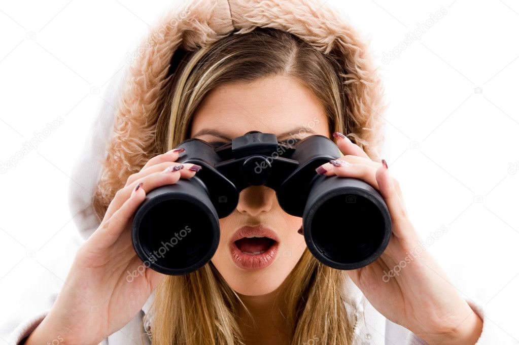 Beautiful woman watching with binoculars