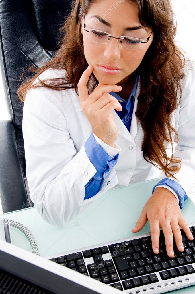 Adult female doctor busy working