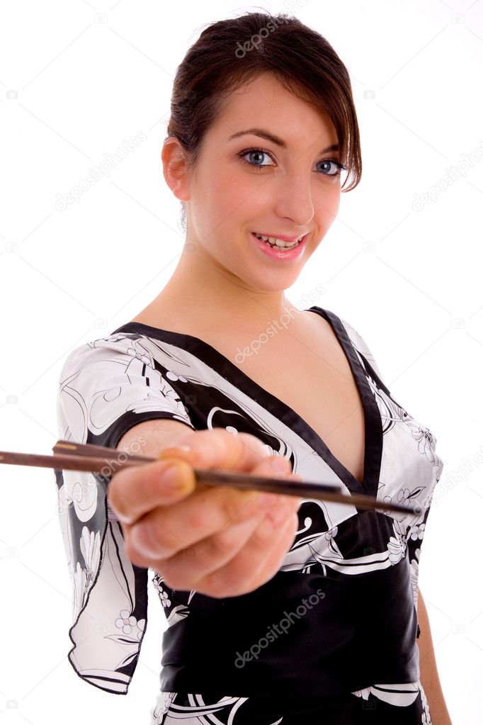 Smiling woman holding chopsticks