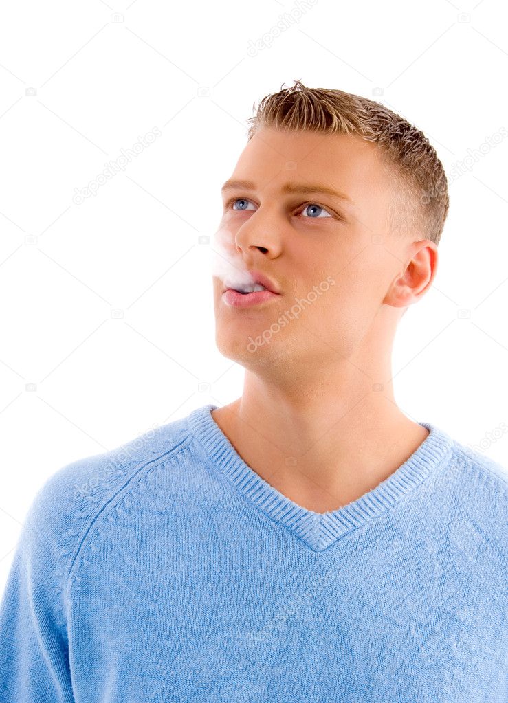 Portrait of smoking adult man