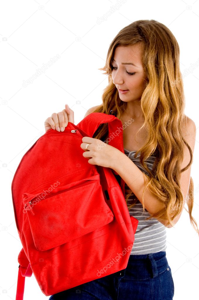 Curious student unziping bag