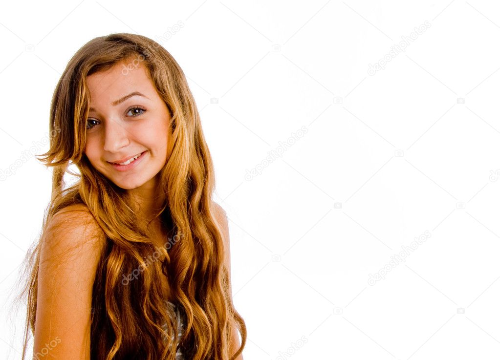 Happy blonde girl smiling at camera