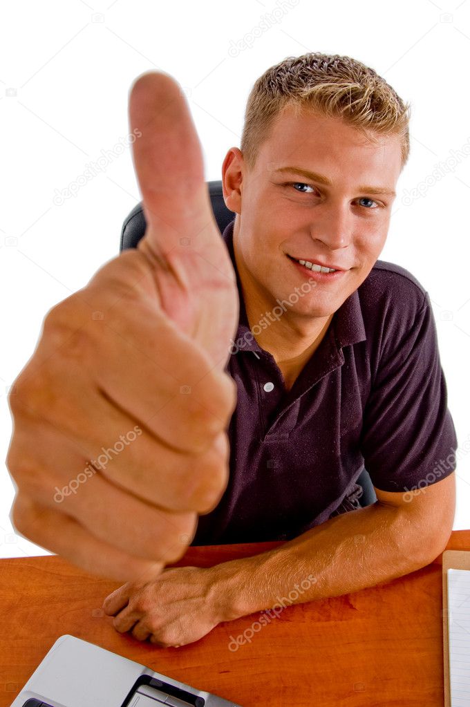 American male showing good luck sign