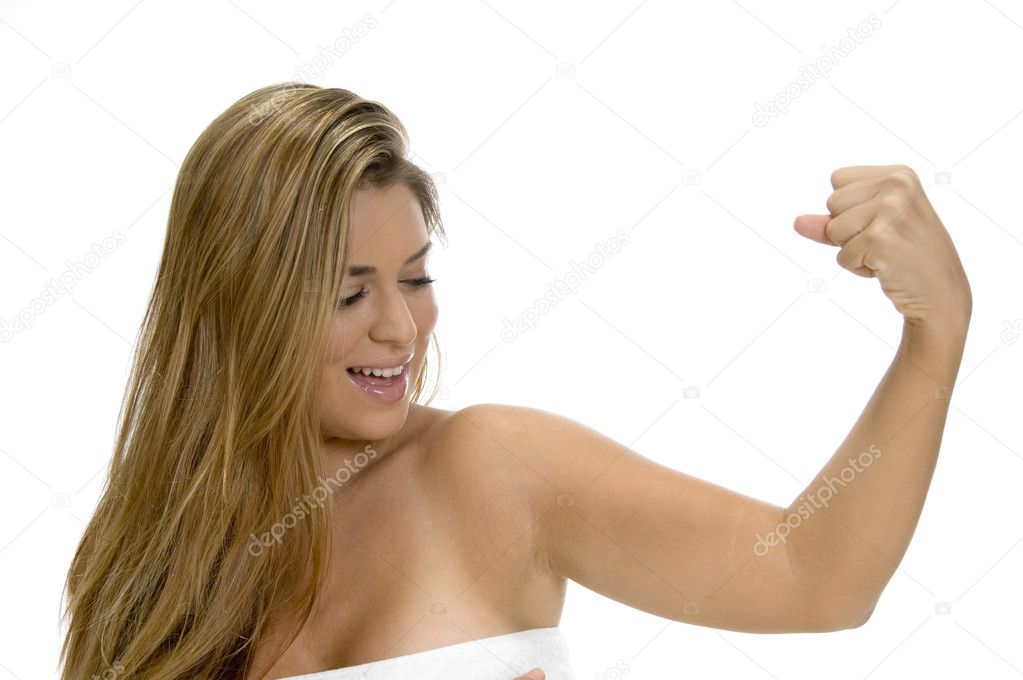 Posing strong blonde lady in towel