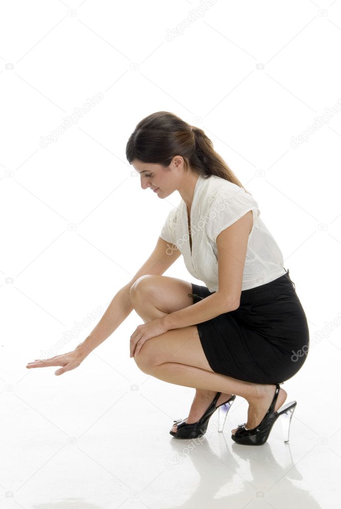Young busineswoman sitting on floor