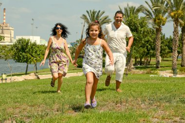 Daughter running ahead of her parents clipart