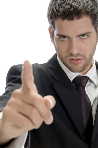 Portrait of young businessman pointing — Stock Photo, Image