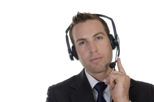 Biznesmen myślenia ze słuchawkami — Zdjęcie stockowe