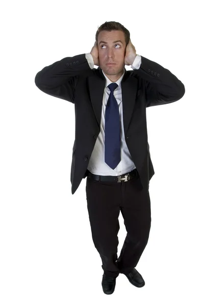 Businessman putting hands on his ears — Stock Photo, Image