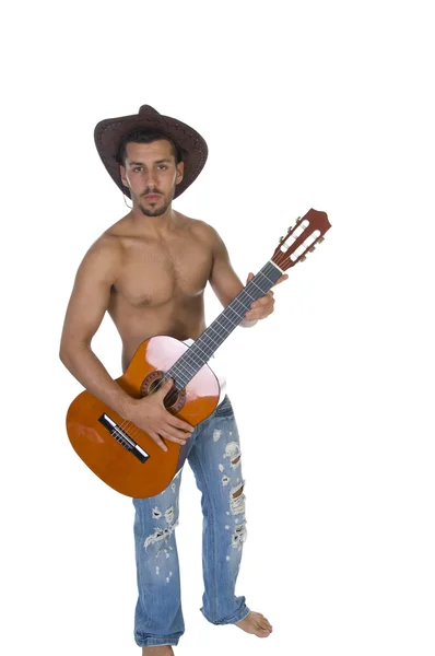 Молодой музыкант держит гитару — стоковое фото