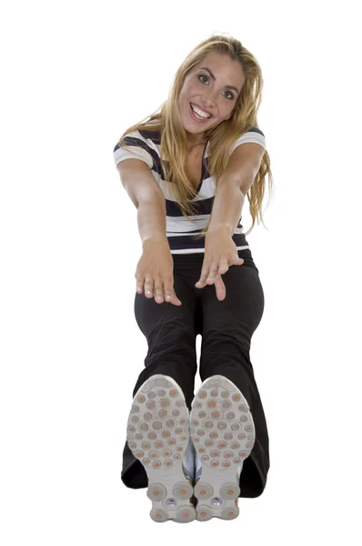 Blonde lady stretching her hads and feet — Stock Photo, Image