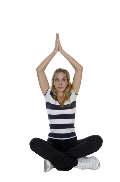 Young woman in yoga pose, joined hands — Stock Photo, Image