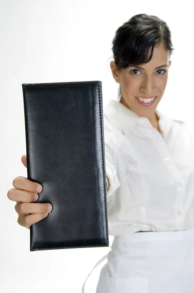 Attractive waitress showing bill book — Stock Photo, Image