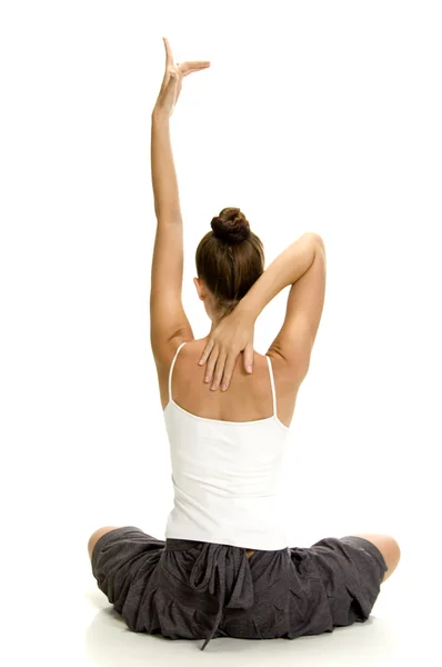 Posa posteriore della donna che fa yoga — Foto Stock