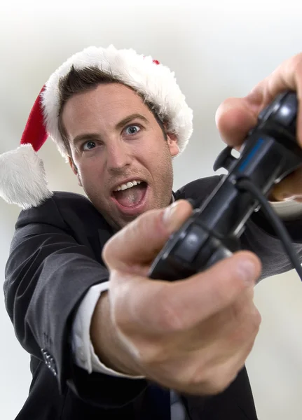 Businessman playing video game — Stock Photo, Image