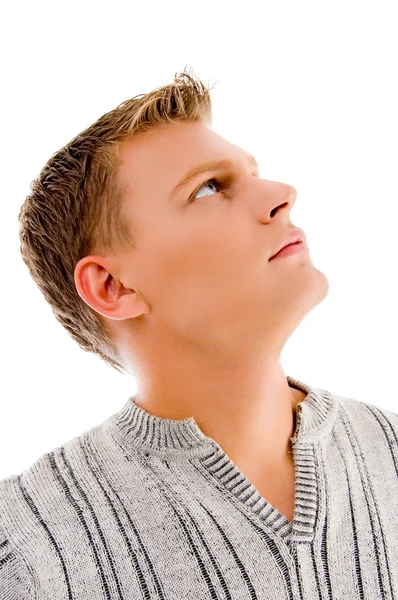 Young man looking upwards — Stock Photo, Image