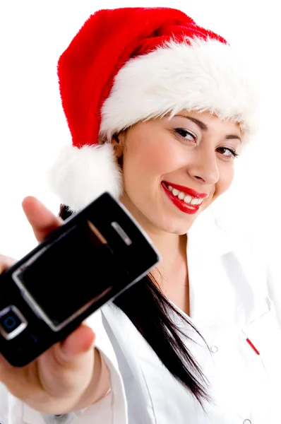 Vánoční dívka ukazuje mobilní — Stock fotografie