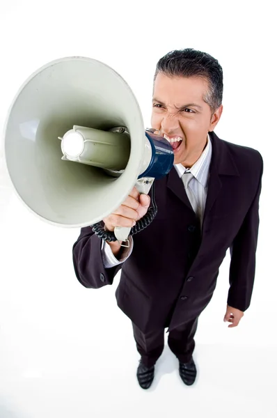 Employee shouting in loudspeaker — Stock Photo, Image