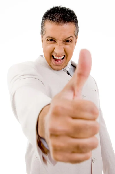 Úspěšný muž ukazuje palec — Stock fotografie