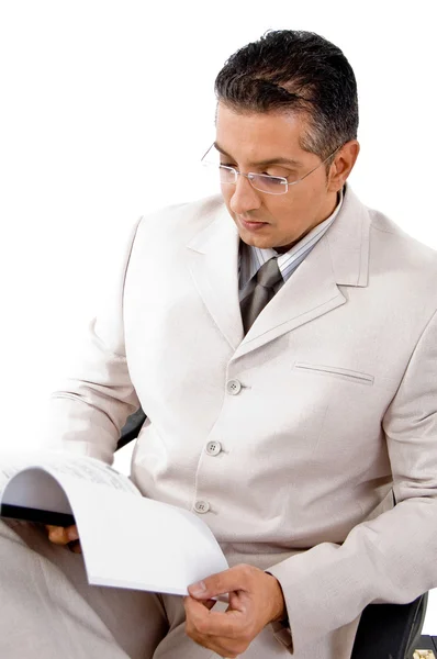 Businessman looking into file — Stock Photo, Image