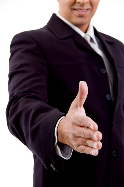 Smiling businessman offering hand shake — Stock Photo, Image