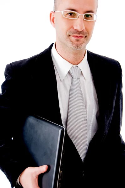 Podnikatel drží jeho laptop — Stock fotografie