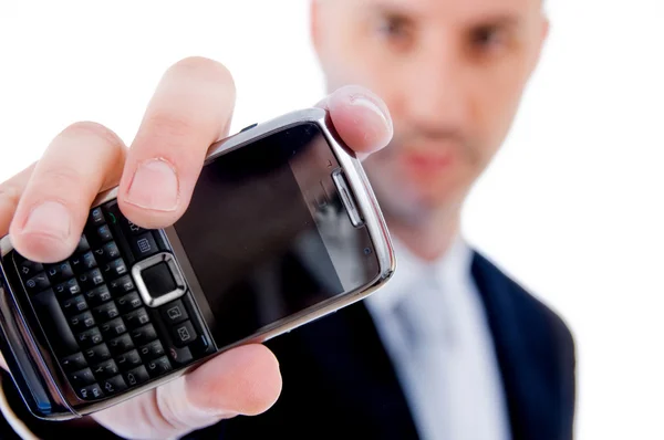 Empresário mostrando celular — Fotografia de Stock