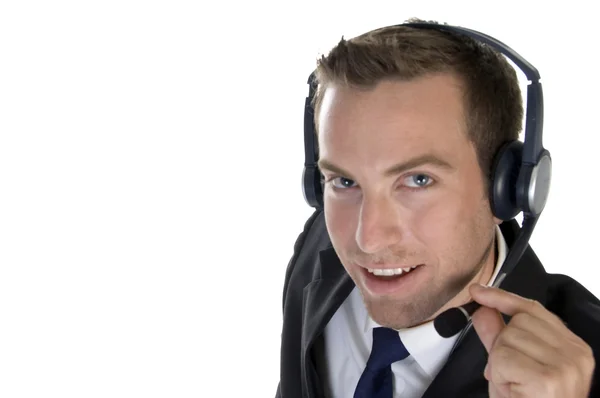 Empresário sorridente com fones de ouvido — Fotografia de Stock