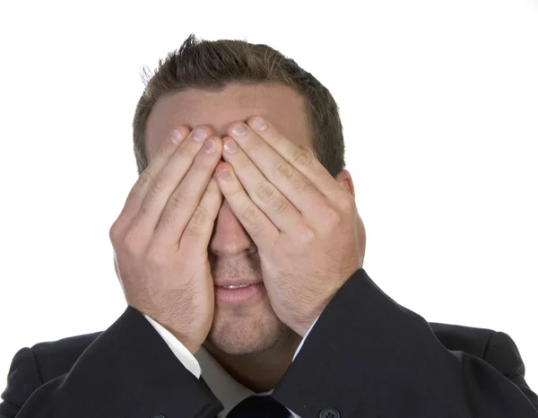 Geschäftsmann versteckt sein Gesicht vor Scham — Stockfoto