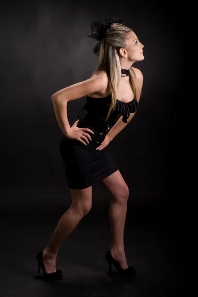 Beautiful young woman bending — Stock Photo, Image