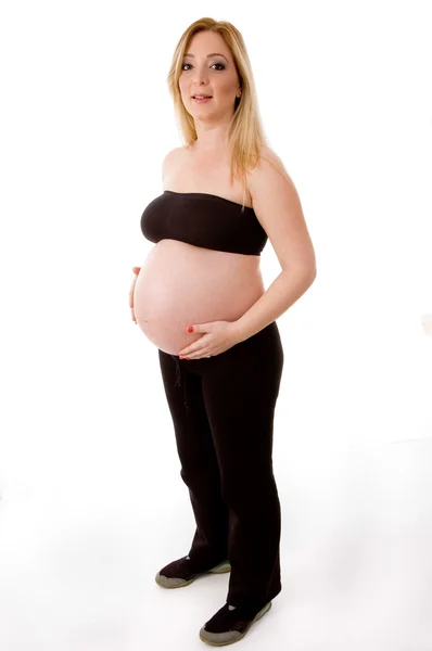 Kobieta w ciąży pozowanie — Zdjęcie stockowe