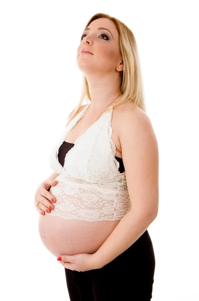 Mulher grávida segurando seu estômago — Fotografia de Stock
