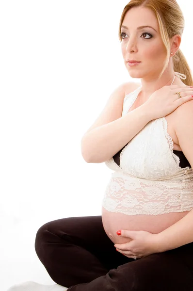 Posada lateral de mujer embarazada rubia —  Fotos de Stock