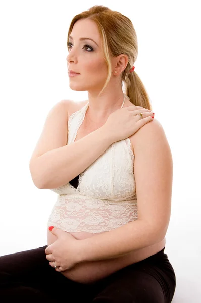 Sidan pose av blondin gravid kvinna — Stockfoto