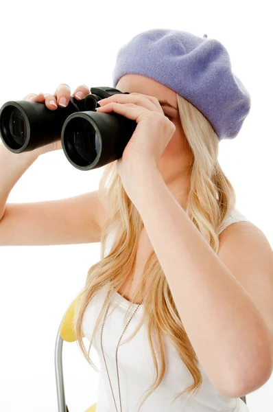 Modelo olhando através binocular — Fotografia de Stock