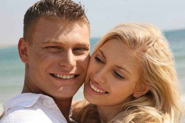 Romantic couple smiling — Stock Photo, Image