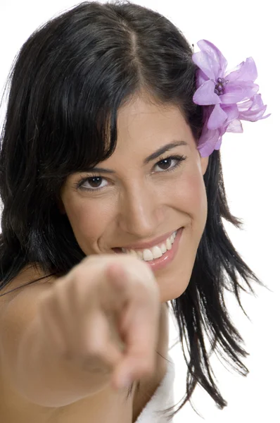 Young woman pointing at camera — Stock Photo, Image
