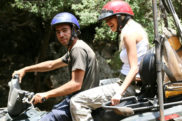 stock image Young couple enjoying quad ride