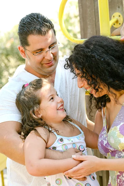 Portrait of smiling family enjoying — Stock Photo, Image