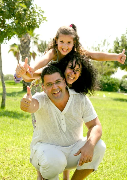 Family with thumbs up — Stock Photo, Image