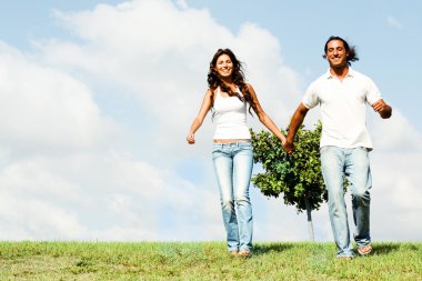 Man and woman running down the ground clipart