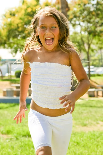 Happy young girl with wide open mouth — Stock Photo, Image