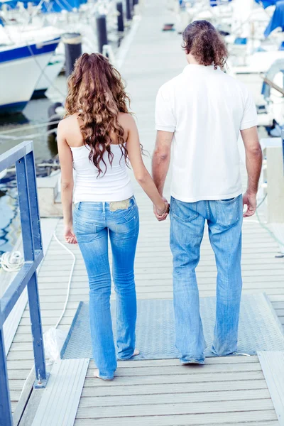 Rear view of couple walking down — Stock Photo, Image