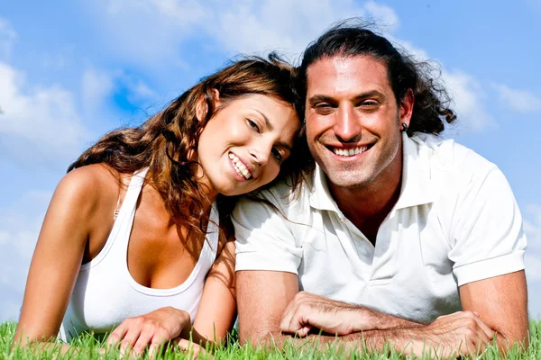 Young couple looking at camera — Stock Photo, Image