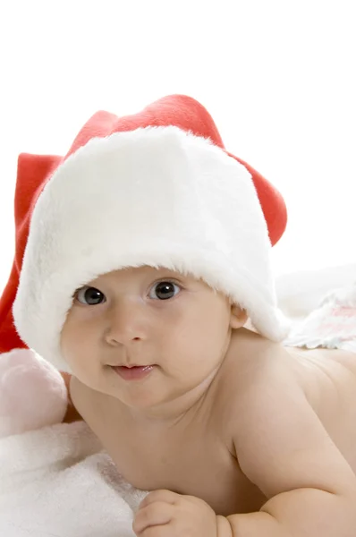 Niño sonriente con gorra de navidad — Foto de Stock