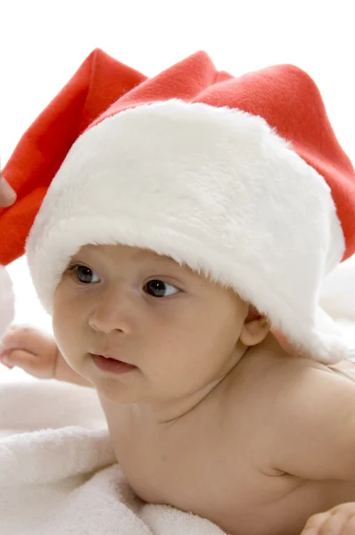 Bonito jovem bebê vestindo santa cap — Fotografia de Stock