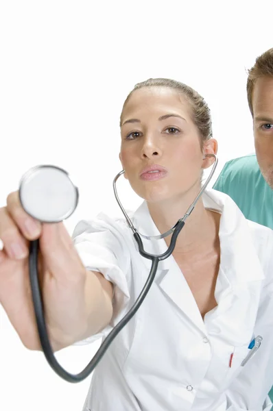 Pani doktor pokazano jej stetoskop — Zdjęcie stockowe
