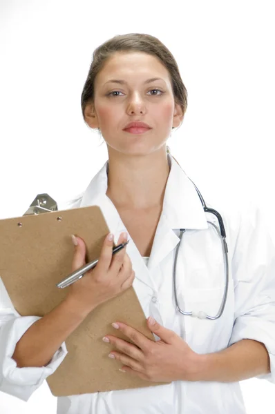Медицинский работник с блокнотом и ручкой — стоковое фото