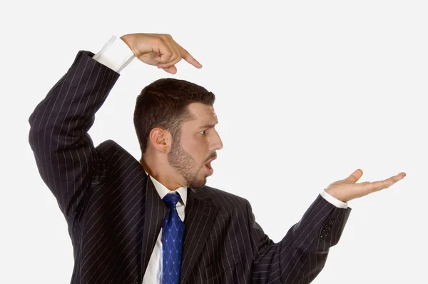 Surprised businessman pointing his palm — Stock Photo, Image