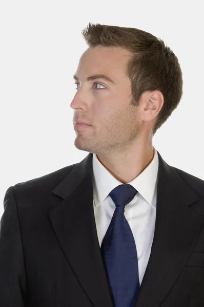 Portrait of businessman looking aside — Stock Photo, Image